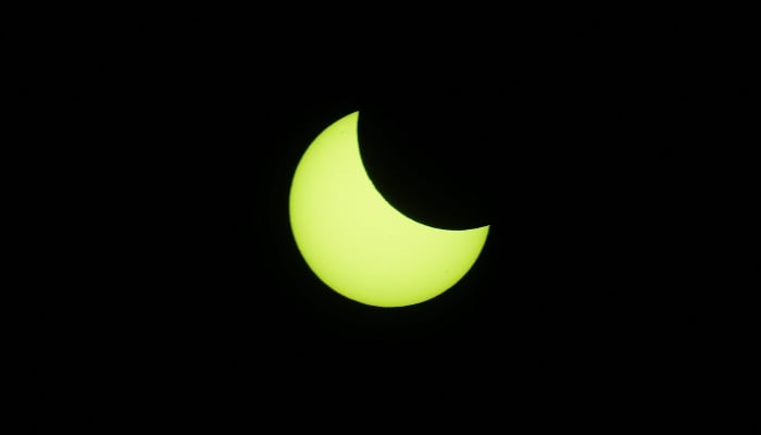 A partial solar eclipse is pictured, in Karachi, October 25, 2022. — Reuters