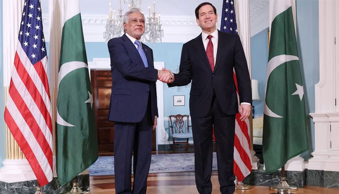 US Secretary of State Marco Rubio and Pakistani Deputy Prime Minister and Foreign Minister Ishaq Dar shake hands for photographers assembled at the State Department in Washington, DC US, July 25, 2025. — Rueyers