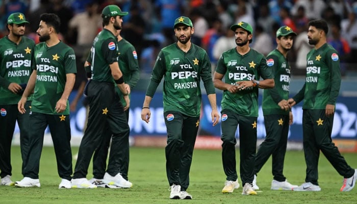 Pakistan captain Salman Agha walks off, with his team-mates behind him, after the defeat against India during Asia Cup 2025 at Dubai International Cricket Stadium, Dubai, United Arab Emirates, September 14, 2025. — AFP