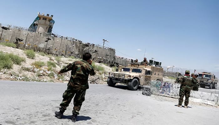 Afghan soldiers stand guard at a checkpoint outside the U.S Bagram air base, on the day the last of American troops vacated it, Parwan province, Afghanistan, July 2, 2021.— Reuters