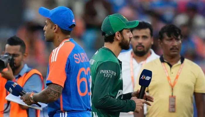 Indian skipper Suryakumar Yadav (left) and Pakistan captain Salman Ali Agha after toss during Asia Cup 2025 clash at Dubai International Cricket Stadium, Dubai, UAE, September 14, 2025. — X@fad08