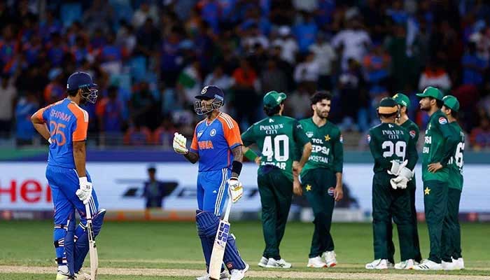 Indias Suryakumar Yadav talks to Shivam Dube during Asia Cup 2025 clash at Dubai International Cricket Stadium, Dubai, UAE, September 14, 2025. — Reuters