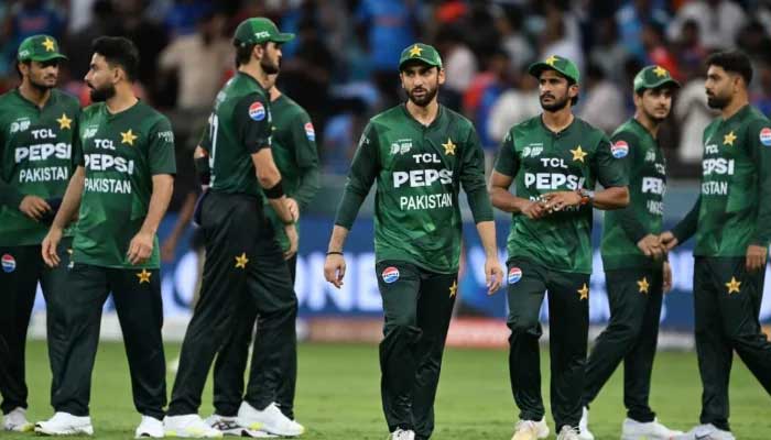 Pakistan team led by Salman Ali Agha walks off the field after their defeat against India in the ACC Mens Asia T20 Cup match at the Dubai International Cricket Stadium in Dubai on September 14, 2025. - AFP
