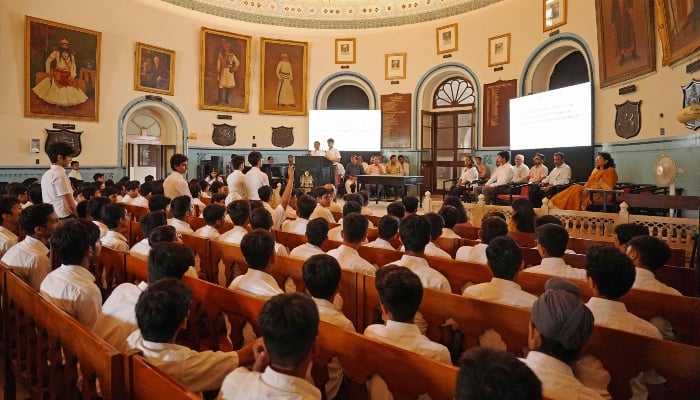 In this photograph taken on August 14, 2025, students and teachers gather inside the assembly hall at the Mayo College school in Ajmer, India. — AFP
