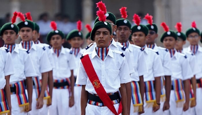 In this photograph taken on August 15, 2025, students and members of the National Cadet Corps (NCC) march during Indias Independence Day celebrations at the Mayo College school in Ajmer. — AFP