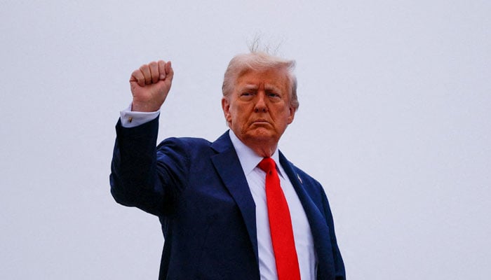 U.S. President Donald Trump gestures, as he boards Air Force One to depart for a memorial service for slain conservative commentator Charlie Kirk, at Joint Base Andrews, Maryland, U.S., September 21, 2025.— Reuters