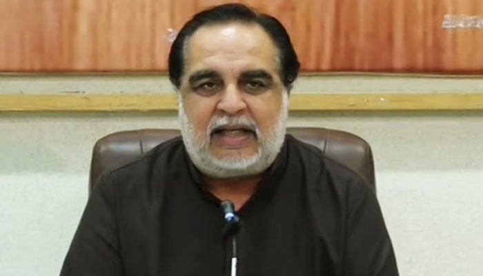 Former Sindh governor Imran Ismail addressing a press conference in Karachi, on May 27, 2023, in this still taken from a video. — YouTube/GeoNews