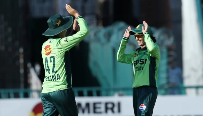 Pakistans Nashra Sandhu celebrates a wicket with her teammate during their third ODI against South Africa at the Gaddafi Stadium in Lahore on September 22, 2025 — PCB