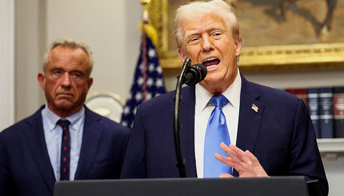 US President Donald Trump, next to U.S. Secretary of Health and Human Services Robert F. Kennedy Jr., makes an announcement linking autism to childhood vaccines and to the use of popular pain medication Tylenol for pregnant women and children, claims which are not backed by decades of science, at the White House, in Washington, D.C., US, September 22, 2025. — Reuters