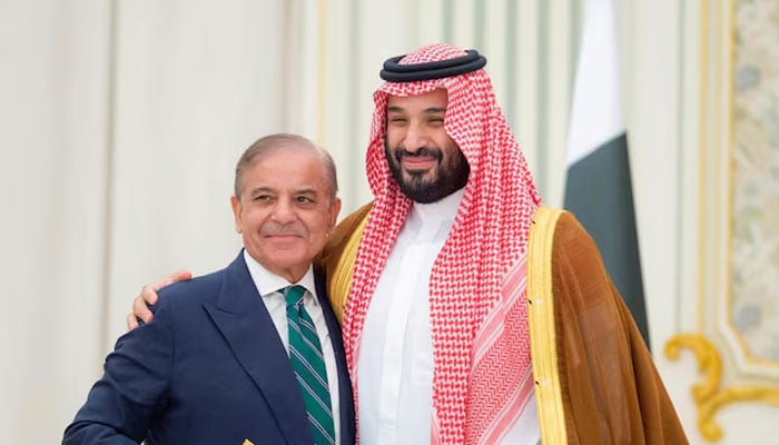 Saudi Crown Prince Mohammed bin Salman and Pakistan Prime Minister Shehbaz Sharif embrace each other on the day they sign a defence agreement, in Riyadh, Saudi Arabia, September 17, 2025. — Reuters