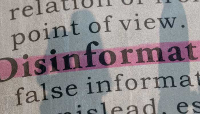 A representational image showing text with highlighted Disinformation term. — AFP/File