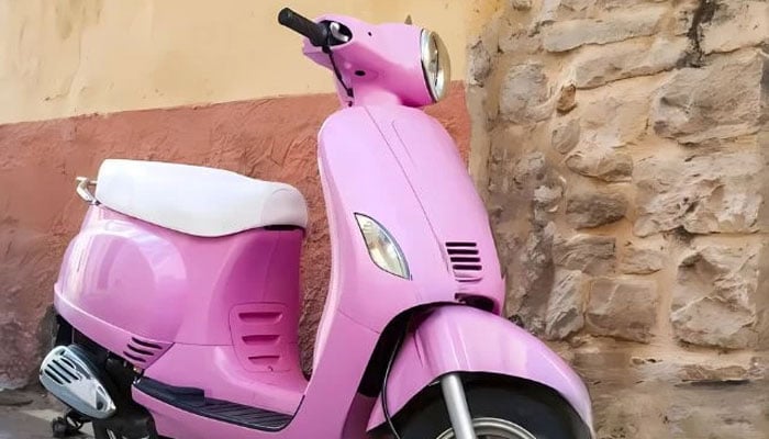 A representational image of a pink scooty. — Government of Sindh website