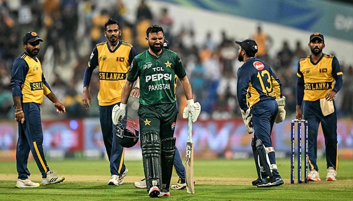 Pakistans Fakhar Zaman (C) reacts after being hit by a delivery during the Asia Cup 2025 Super Four match between Pakistan and Sri Lanka at the Sheikh Zayed Cricket Stadium in Abu Dhabi on September 23, 2025. — AFP