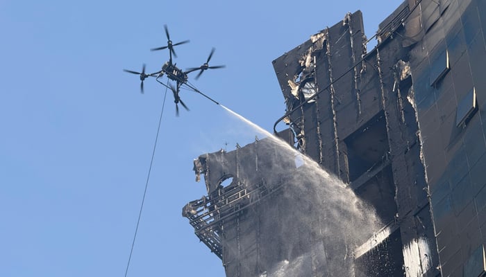 Dubai Civil Defense deploys ‘Shaheen’ drones to combat the fire in a building in Al Barsha, on September 23, 2025. — X@DXBMediaOffice