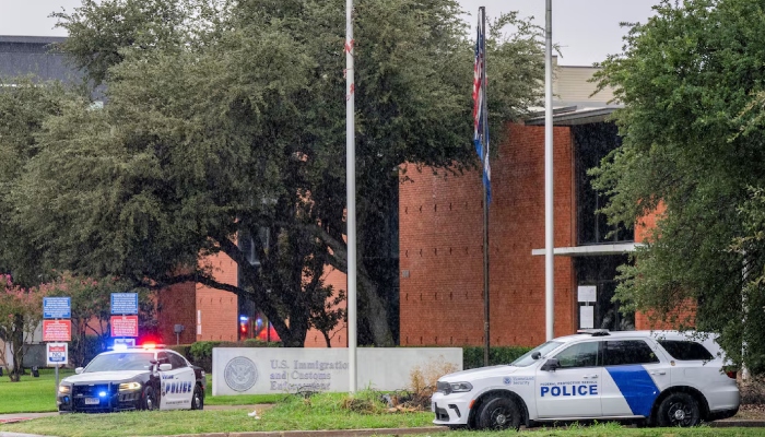 Law enforcement personnel respond at the scene of a shooting at an Immigration and Customs Enforcement (ICE) field office in Dallas, Texas, US on September 24, 2025. — Reuters