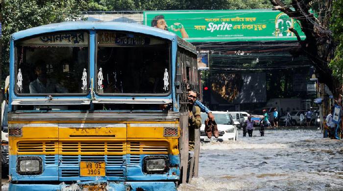 At least 12 dead as record rain floods India’s Kolkata