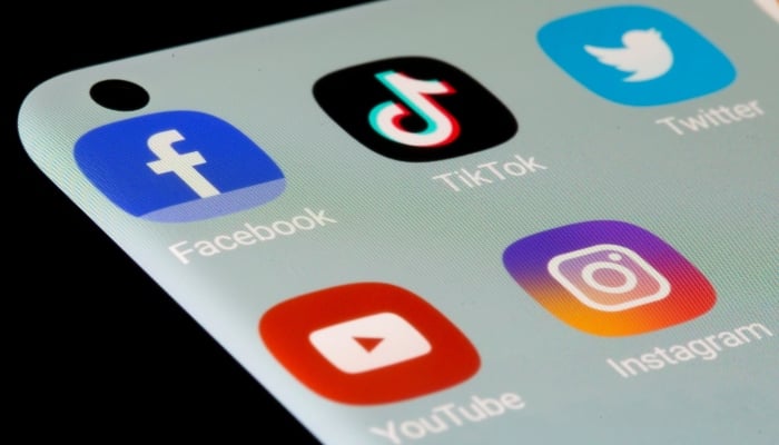 Facebook, TikTok, Twitter, YouTube and Instagram apps are seen on a smartphone in this illustration taken, July 13, 2021. — Reuters