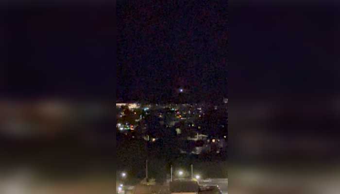 A light moves in the sky over Aalborg, amid reports of drone sightings that led to the citys airport, used for commercial and military flights, being closed due to drones in its airspace, in Aalborg, Denmark, September 24, 2025, in this screengrab taken from social media video. — Reuters