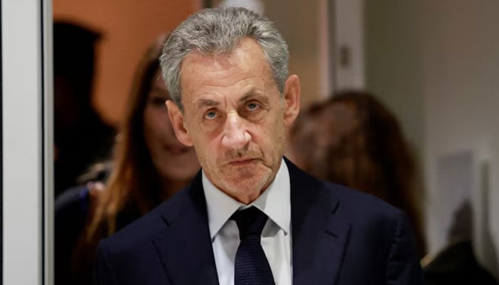 Former French President Nicolas Sarkozy leaves after the verdict in his trial with other defendants on charges of corruption and illegal financing of an election campaign related to alleged Libyan funding of his successful 2007 presidential bid, at the courthouse in Paris, France, September 25, 2025.— Reuters