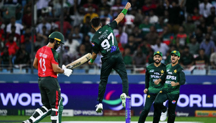 Pakistans Haris Rauf (C) leaps in the air to celebrate after dismissing Bangladeshs Saif Hassan (L) during the Asia Cup 2025 Super Fours match at the Dubai International Stadium in Dubai on September 25, 2025. — AFP
