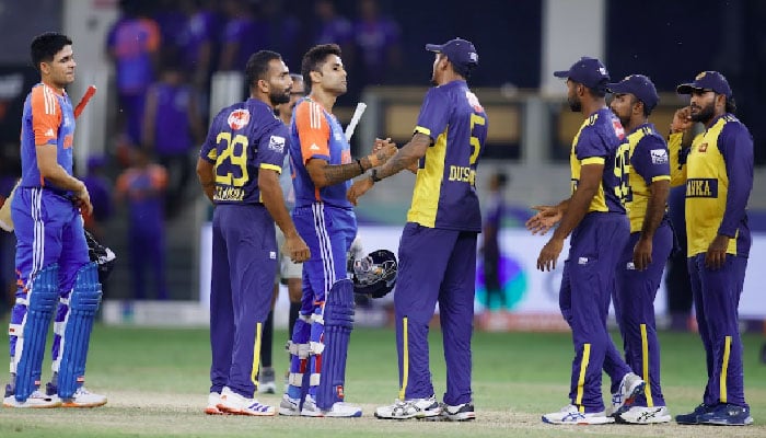 India skipper Suryakumar Yadav shake hands with Sri Lanka players after winning the Asia Cup 2025s Super Fours match at Dubai International Cricket Stadium on September 26, 2025. — ACC
