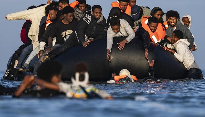 A group of migrants on an inflatable dinghy leaves the coast of northern France in an attempt to cross the English Channel to reach Britain, from the beach of Petit-Fort-Philippe in Gravelines, near Calais, France, August 25, 2025. —Reuters