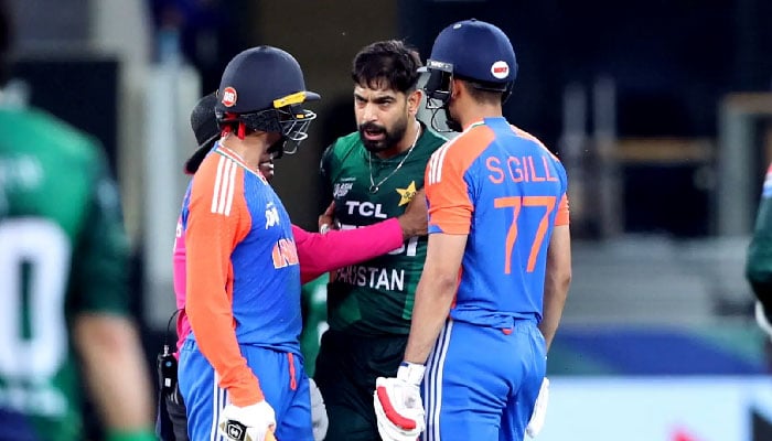India’s Shubman Gill and Abhishek Sharma clash with Pakistan’s Haris Rauf during the Asia Cup Super Four match against Pakistan at the Dubai International Cricket Stadium on Sunday.—Reuters