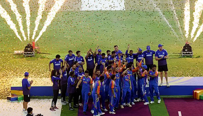 India players celebrate after winning the Asia Cup during the trophy presentation. — Reuters