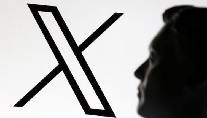 A 3D-printed miniature model of Elon Musk and the X logo are seen in this illustration taken January 23, 2025. — Reuters