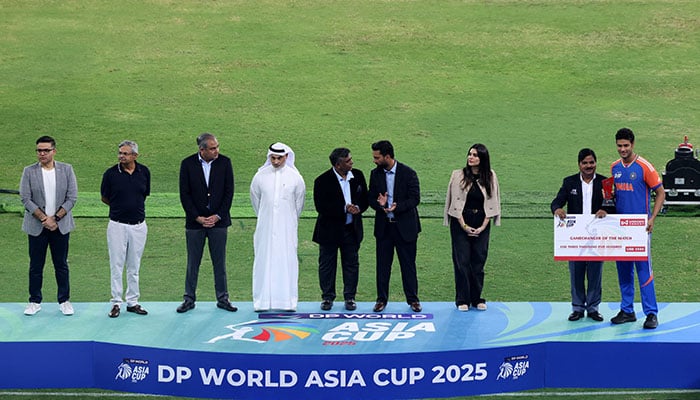 ACC President Mohsin Naqvi stands on the podium with Emirates Cricket Board Vice Chairman Khalid Al Zarooni before the trophy presentations following Asia Cup final at Dubai International Cricket Stadium, September 28, 2025. — Reuters