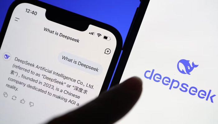 The logo of DeepSeek is displayed alongside its AI assistant app on a mobile phone, in this illustration picture taken January 28, 2025. —  Reuters