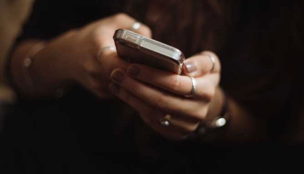 A representative image showing a woman using a cellphone. — Unsplash