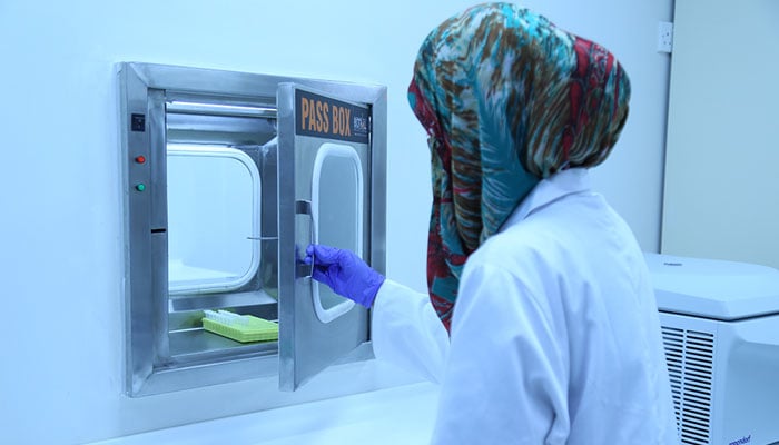 A doctor at Sindh Forensic DNA and Serology Laboratory in University of Karachi. — SFDSL website