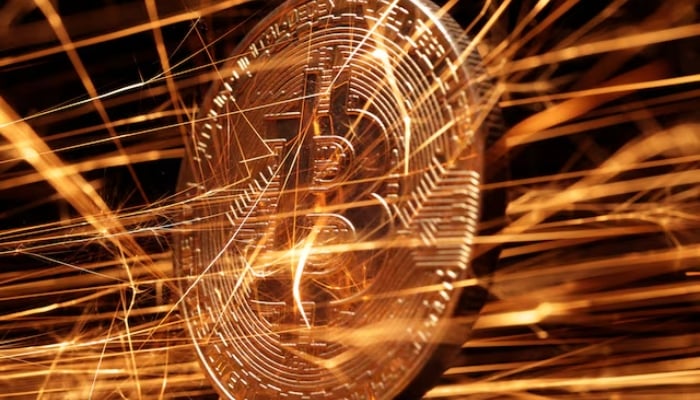 Sparks strike representation of cryptocurrency Bitcoin in this illustration taken November 24, 2024. — Reuters