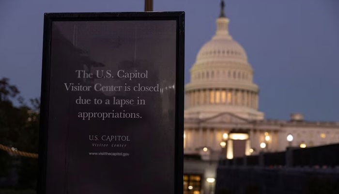 The US Capitol is seen behind signage indicating its closure due to a partial government shutdown in Washington, DC, US, October 5, 2025.— Reuters