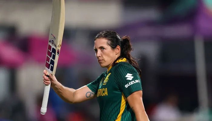 South Africas Tazmin Brits walks back to the pavilion after scoring a century during their ICC Womens Cricket World Cup match against New Zealand at the Holkar Cricket Stadium in Indore on October 6, 2025. — ICC