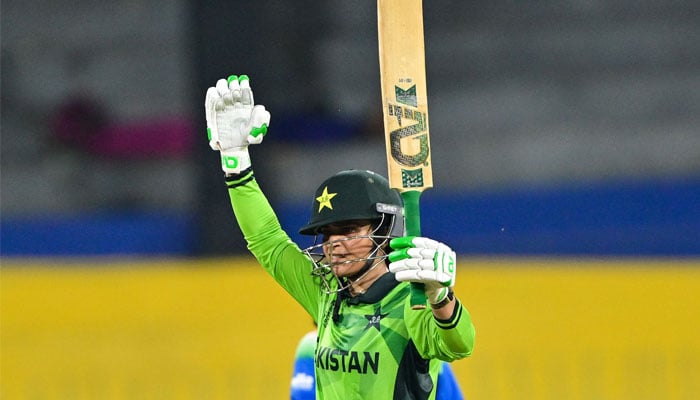 Pakistans Sidra Amin celebrates scoring a half-century (50 runs) during the ICC Womens Cricket World Cup 2025 one-day international (ODI) match between India and Pakistan at the R. Premadasa International Cricket Stadium in Colombo on October 5, 2025.— AFP