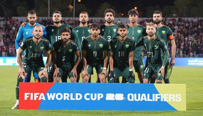 Pakistan mens football team poses for a picture ahead of their FIFA World Cup 2026 Asian Qualifiers match against Jordan at the Amman International Stadium in Amman on March 27, 2024. — PFF