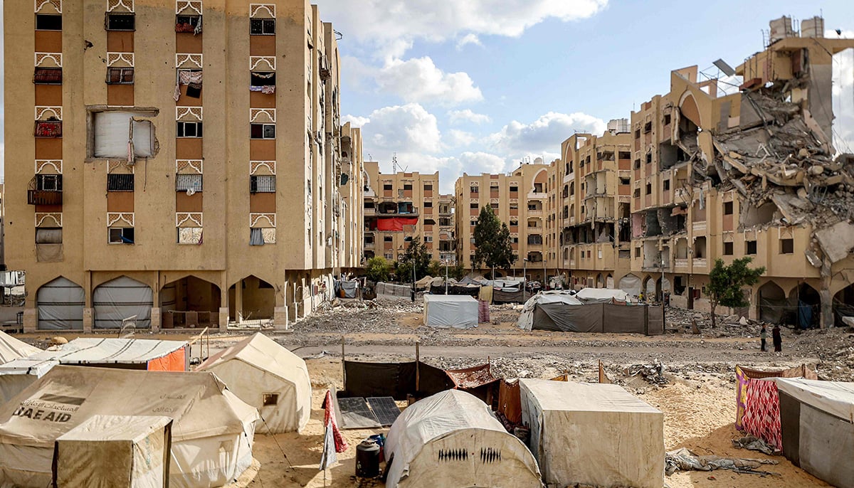 Displaced Palestinians take shelter in tents, after fleeing their homes due to the Israeli military offensive, in Nuseirat, central Gaza Strip, October 7, 2025. — Reuters