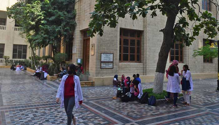 Students gather at a yard of the Dow University of Health Sciences in Karachi. — AFP/File