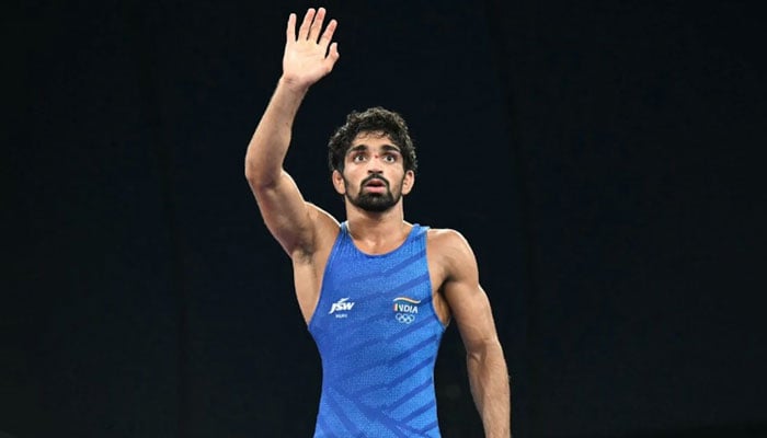 Indias Olympic medallist Aman Sehrawat poses for a photo. — AFP/File