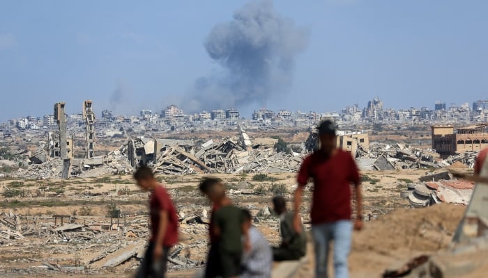 Smoke rises following explosions amid the Israeli military offensive in Gaza City, as seen from the central Gaza Strip, October 6, 2025. — Reuters