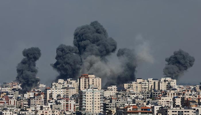 Smoke rises following Israeli strikes in Gaza, October 7, 2023. — Reuters