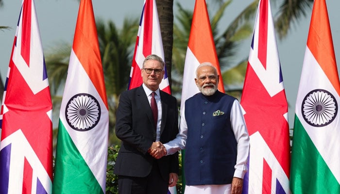 United Kingdom Prime Minister Keir Starmer poses while meeting his Indian counterpart Narendra Modi, during his first visit to India on Oct 9, 2025. — X/@narendramodi
