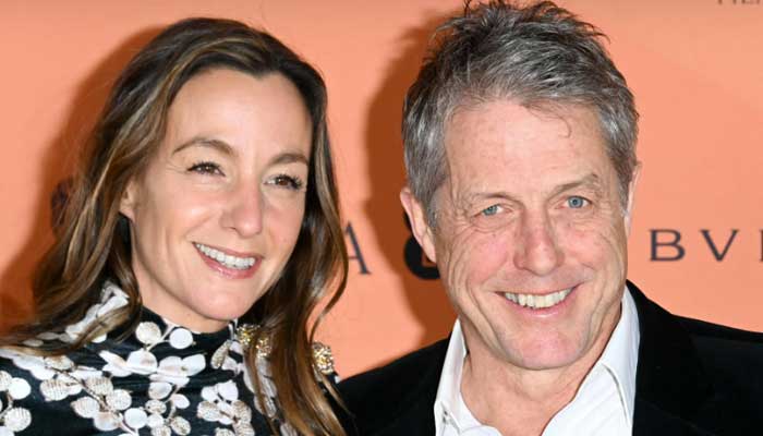 Hugh Grant with his wife Anna: File photo