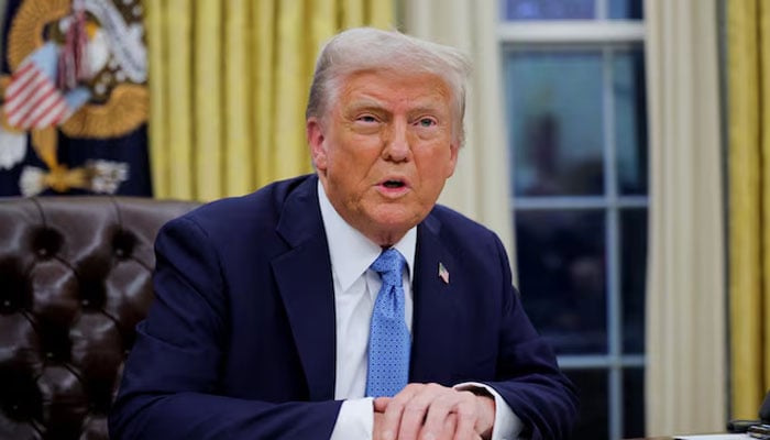 US President Donald Trump looks on as he signs an executive order in the Oval Office at the White House in Washington, US, January 31, 2025. — Reuters