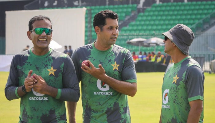 Asif Afridi (centre) talks to Pakistan spin bowling coach Abdur Rehman during training session ahead of first Test against South Africa on October 9, 2025, in Lahore. — X PCB@TheRealPCB