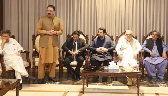 PTI leader Junaid Akbar Khan (second from left) speaks during a parliamentary meeting in Peshawar, October 11, 2025. — X/@JunaidAkbarMNA