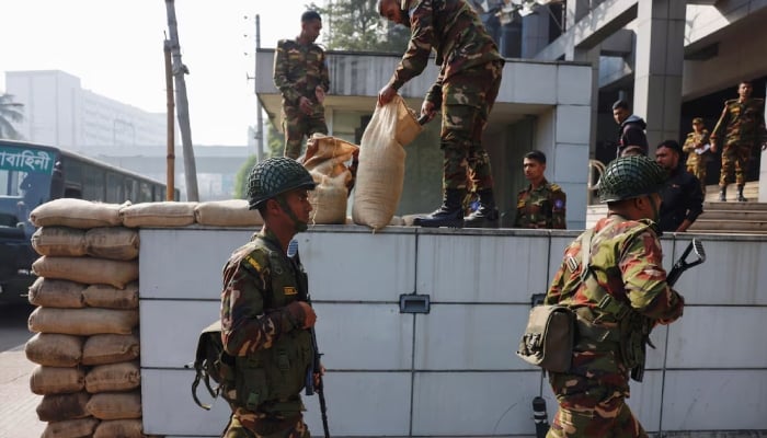 Members of Bangladesh Army arrive at a temporary camp after the army was deployed across the country in order to help civil administration during general election in Dhaka, Bangladesh, January 3, 2024. — Reuters
