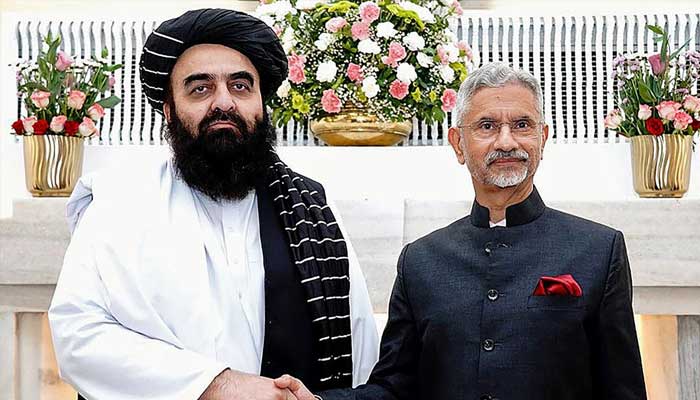 This handout photograph taken and released by India’s Ministry of External Affairs on October 10, 2025 shows India’s Foreign Minister Subrahmanyam Jaishankar (R) and his Afghan counterpart Amir Khan Muttaqi shaking hands during a bilateral meeting in New Delhi. — AFP